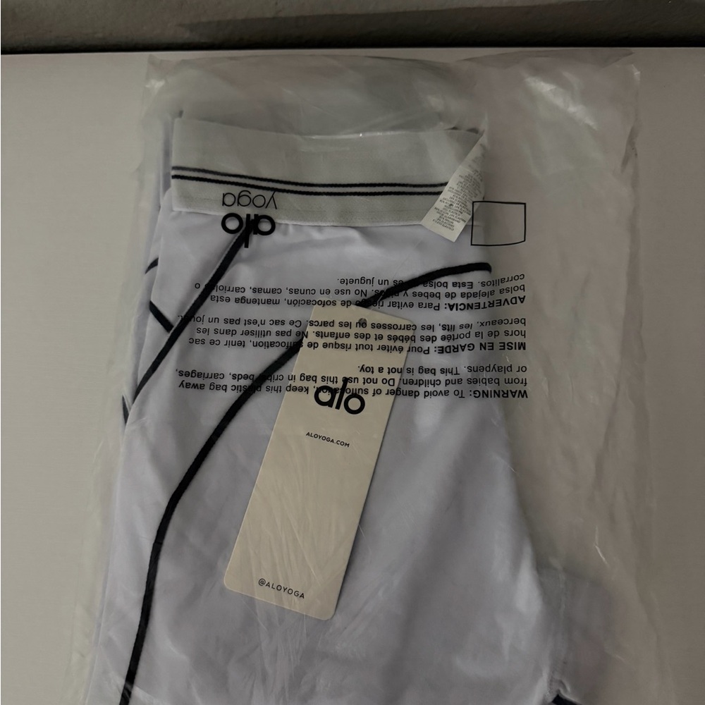 ALO Yoga White and Black Trim Sports Bra - Picture 3 of 3